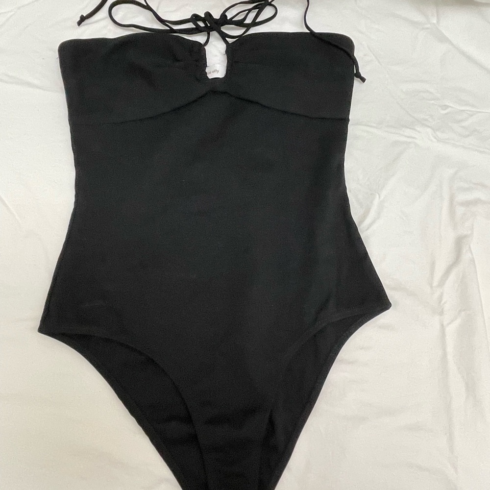 VICI Black Strapy bodysuit. SMALL. NEVER WORN. NON SMOKING. NWOT.